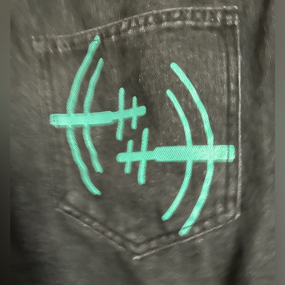 Men’s small black denim jeans with star appliqué. - Picture 3 of 7